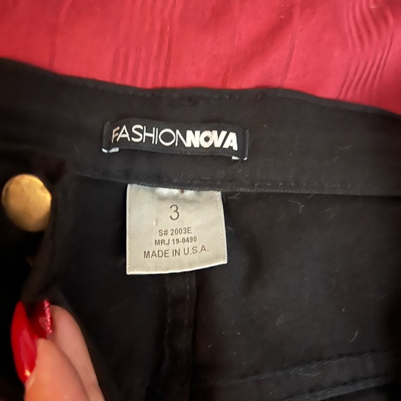 Fashion Nova ripped stretchy black capris - Picture 2 of 3